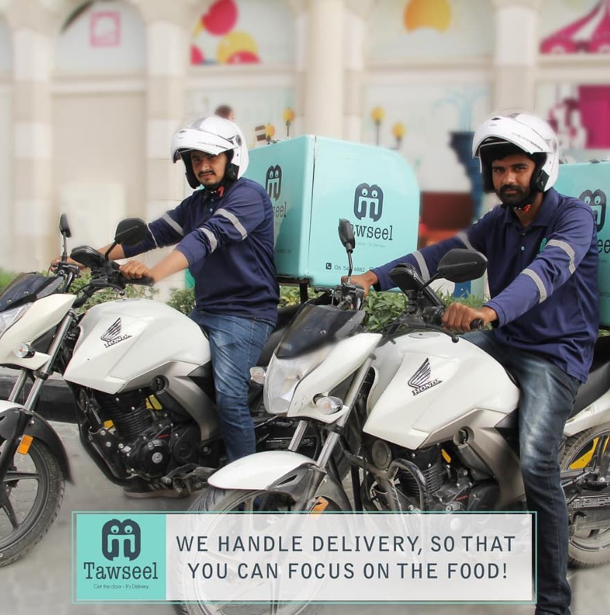 Two Tawseel riders on motorbikes: “We handle delivery, so that you can focus on the food!”