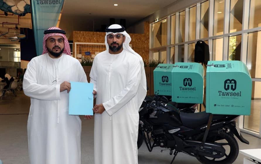 Tawseel management with branded delivery motorbikes